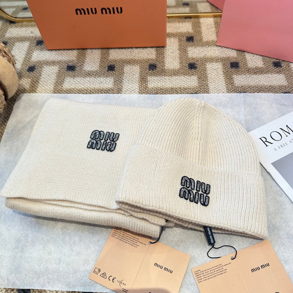 Ensemble en maille de laine crème Miu Miu 979749