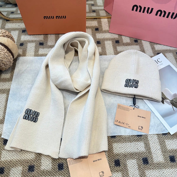 Ensemble en maille de laine crème Miu Miu 979749