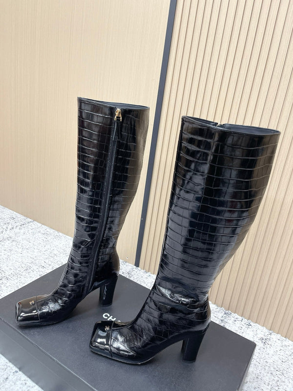 Bottes montantes Chelsea noires CHANEL automne/hiver en cuir de vachette 591402