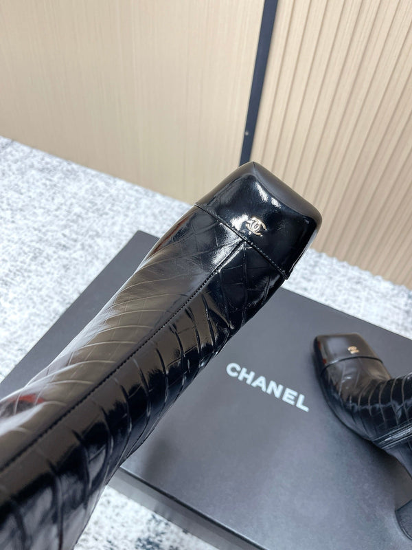 Bottes montantes Chelsea noires CHANEL automne/hiver en cuir de vachette 591402