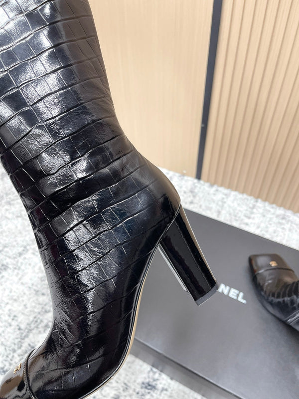 Bottes montantes Chelsea noires CHANEL automne/hiver en cuir de vachette 591402