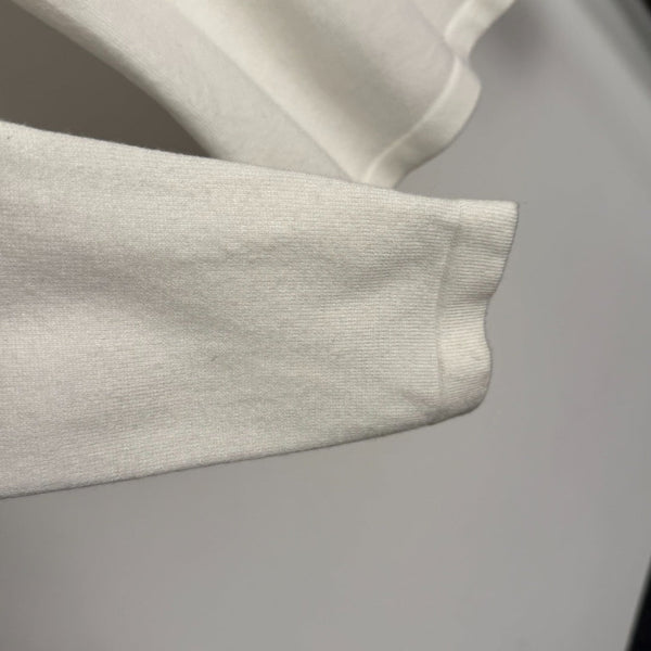 T-shirt en maille à manches longues Chanel avec logo Chanel brodé