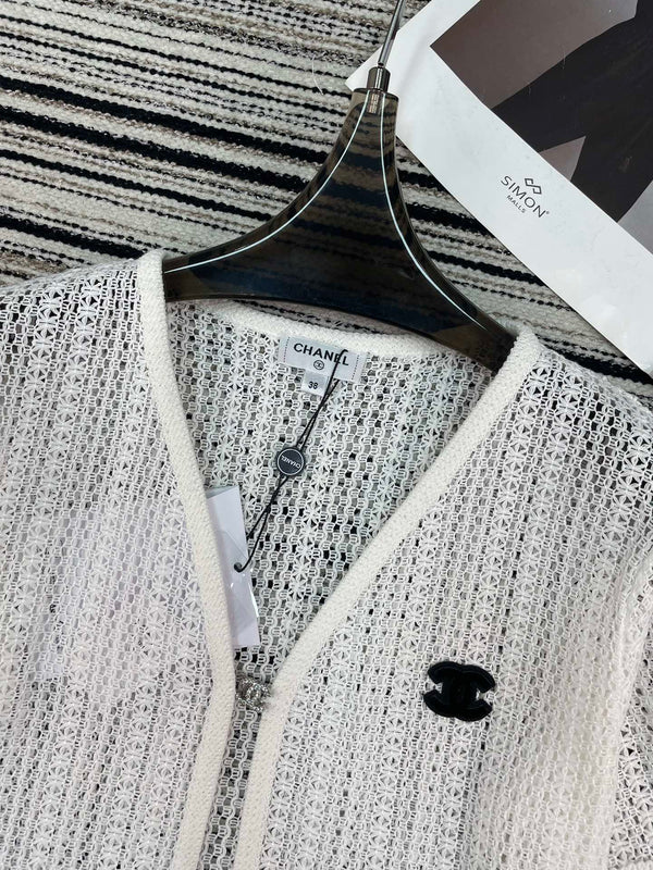 Haut à manches courtes en maille Chanel blanc en coton 133512