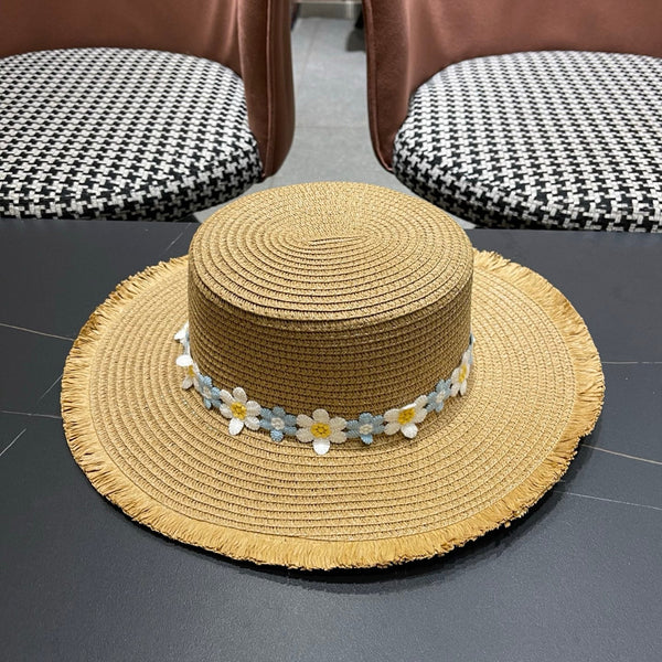 Chapeau de soleil de plage Chanel bleu et blanc floral chameau en paille 197496