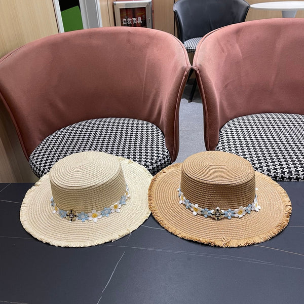 Chapeau de soleil de plage Chanel bleu et blanc floral chameau en paille 197496