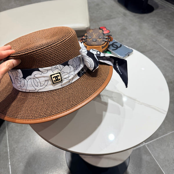 Chapeau de paille marron à calotte plate Chanel 201528