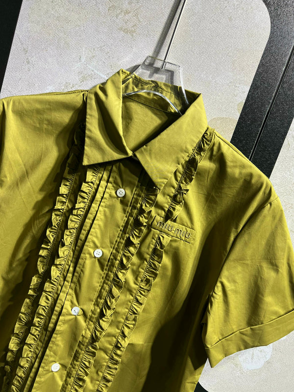 Chemisier à manches courtes vert à volants et jupe en coton Miu Miu 250945