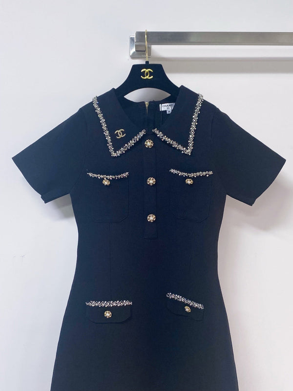 Robe Chanel manches courtes noire en polyester 262507