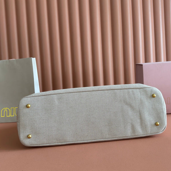 Miu Miu Aventure Handbag 44 Beige in Canvas 285306
