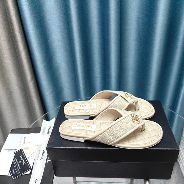 Chanel 26P Flip-Flops Cream in Woven 712314