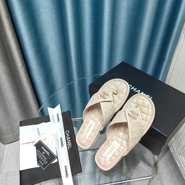 Chanel 26P Flip-Flops Cream in Woven 712314