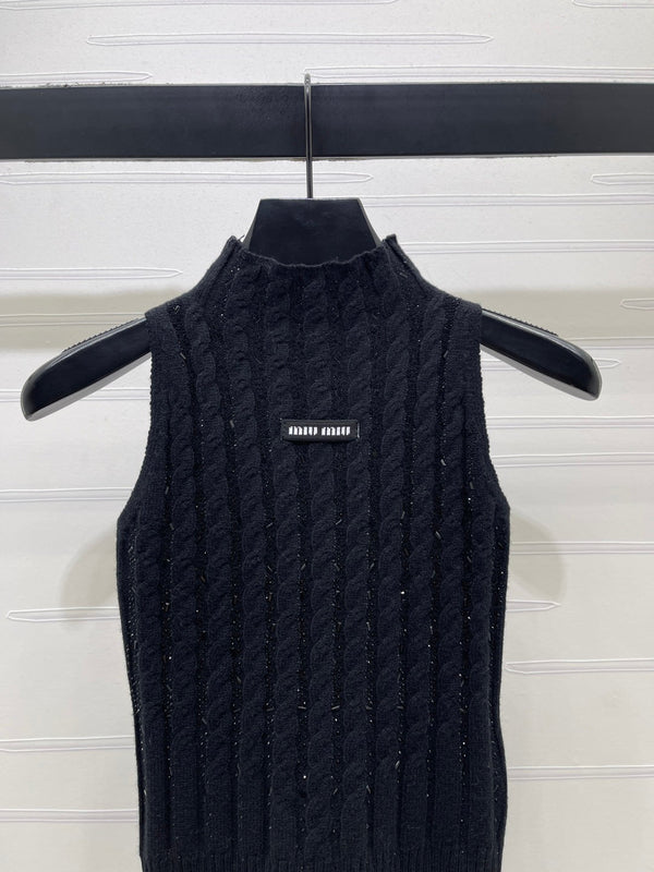 Miu Miu Gilet sans manches en laine noir avec câble torsadé épais 26 366350