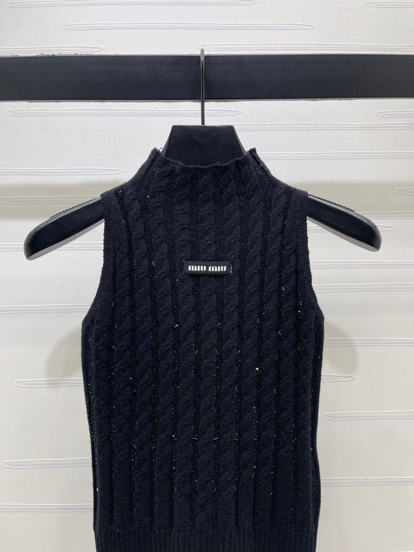 Miu Miu Gilet sans manches en laine noir avec câble torsadé épais 26 366350