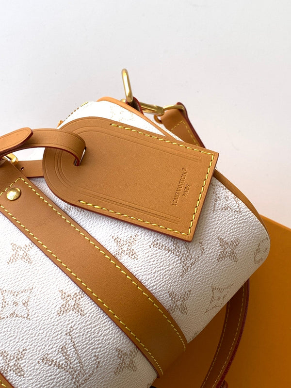 LV Keepall 25 Bandoulière Handbag White in Monogram coated Canvas 287218