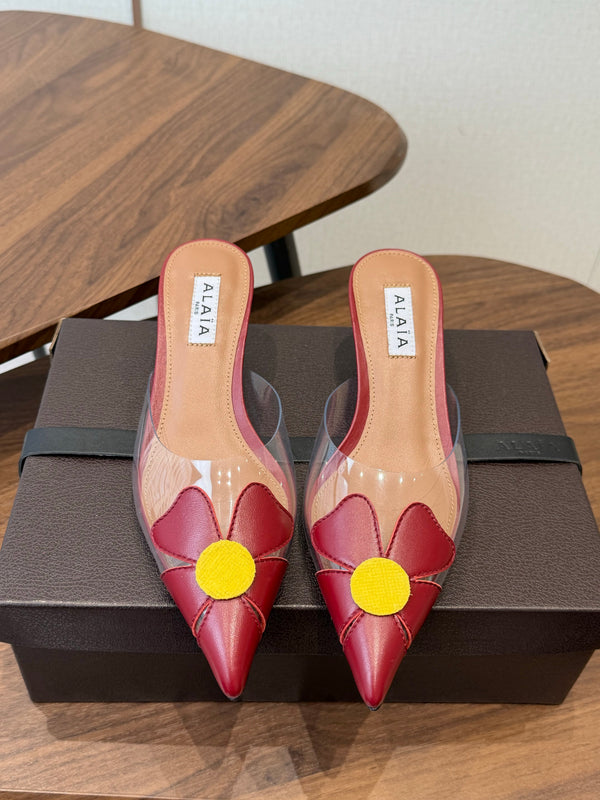 Alaia Round Flower Mules 55mm Cowhide Clear PVC 889940