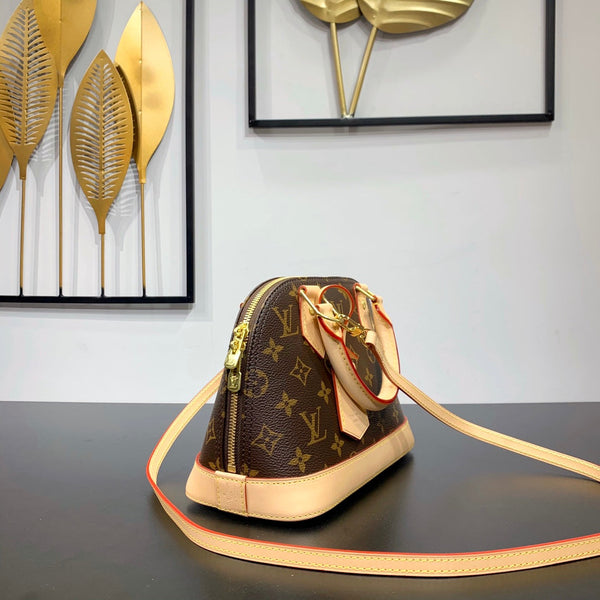 ALMA BB 23 IN TELA MONOGRAM MARRONE E RIFINITURE IN PELLE DI VITELLO BEIGE, FIBBIA ORO