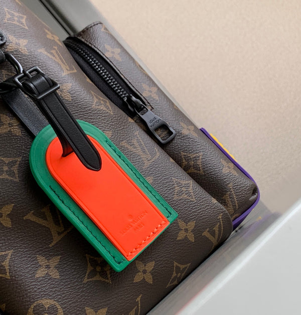 ZAINO DISCOVERY 40 IN TELA MONOGRAMMA MARRONE CON LOGO IN GOMMA