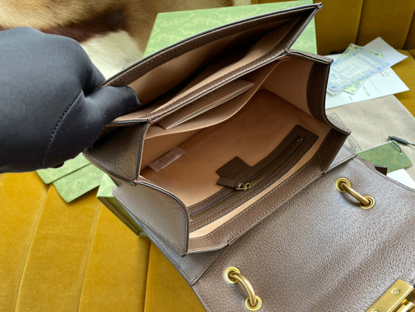 BORSA A MANO GG MINI 25 IN TELA BEIGE E PELLE DI VITELLO MARRONE