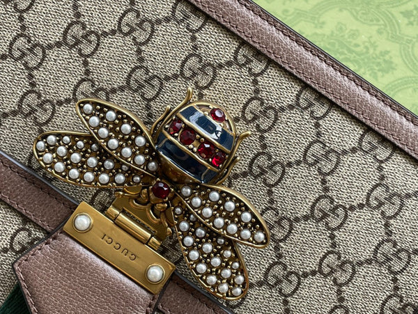 BORSA A MANO GG MINI 25 IN TELA BEIGE E PELLE DI VITELLO MARRONE