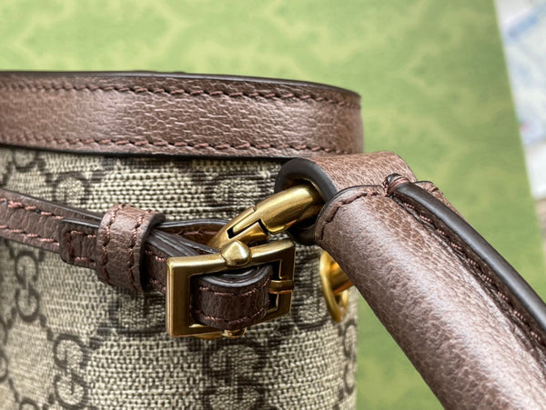 BORSA A MANO GG MINI 25 IN TELA BEIGE E PELLE DI VITELLO MARRONE