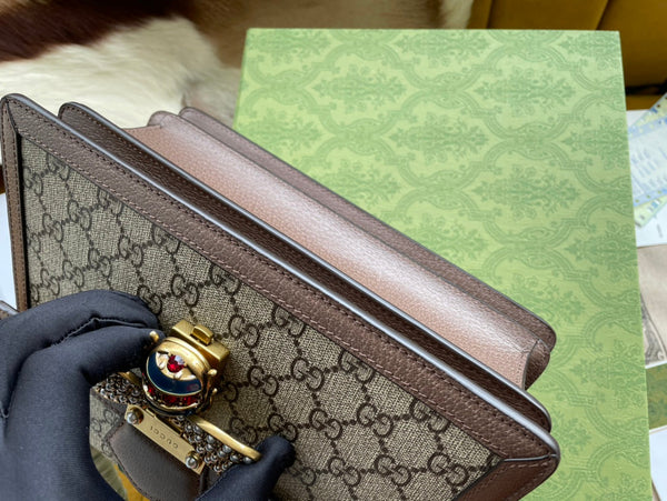 BORSA A MANO GG MINI 25 IN TELA BEIGE E PELLE DI VITELLO MARRONE