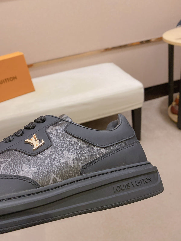 LV TRAINER IN BLACK MIX DARK BROWN CALFSKIN