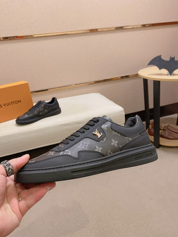 LV TRAINER IN BLACK MIX DARK BROWN CALFSKIN