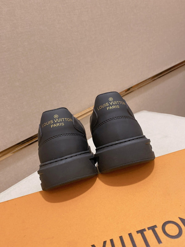 LV TRAINER IN BLACK MIX DARK BROWN CALFSKIN