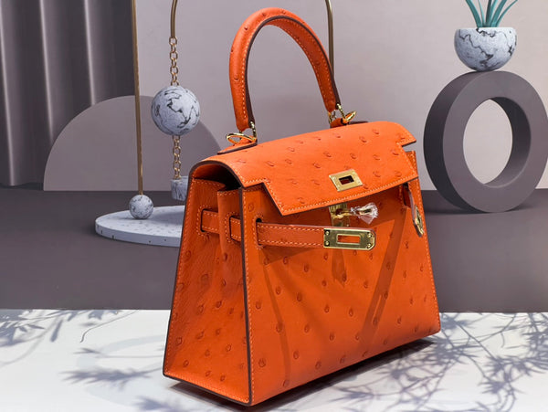 KELLY BAG 20 IN FIRE ORANGE OSTRICH LEATHER WITH GOLD HARDWARE (MADE - TO - ODER)