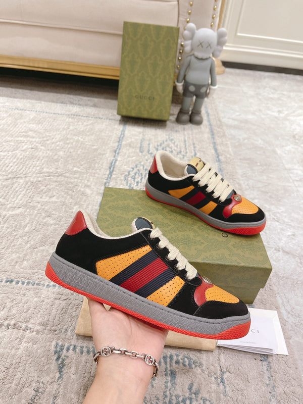 Sneaker GG Screener da uomo in pelle scamosciata arancione nera 574724