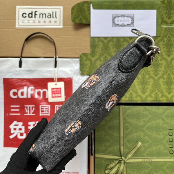 POCHETTE CON STAMPA TIGRE 30 IN TELA MONOGRAMMA NERA