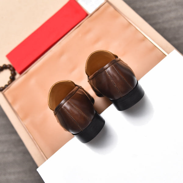 Mocassino da uomo GG in pelle di vacchetta marrone 522704