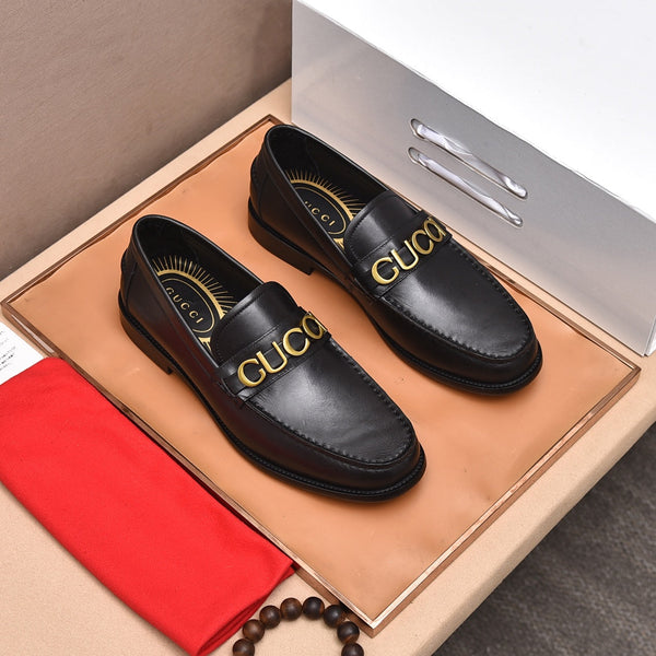 Mocassino da uomo GG in pelle di vacchetta marrone nera 522699