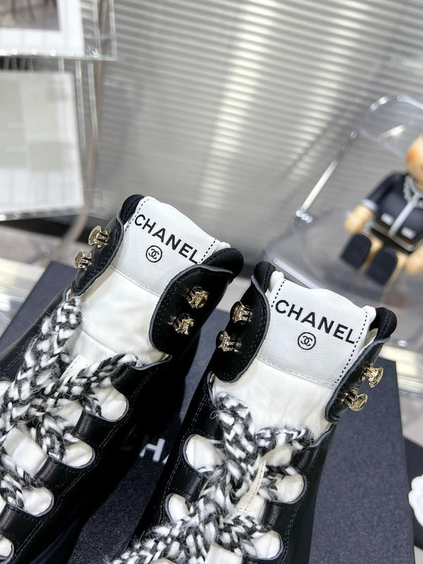 CC CANO ALTO SNEAKER IN BLACK CALFSKIN AND RUBBER