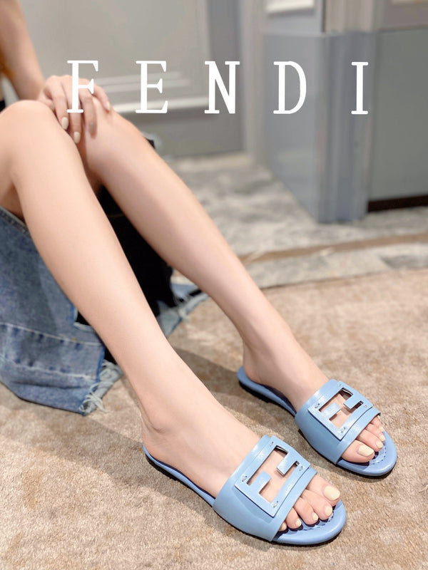 FENDI BAGUETTE SLIDES IN BABY BLUE LAMBSKIN