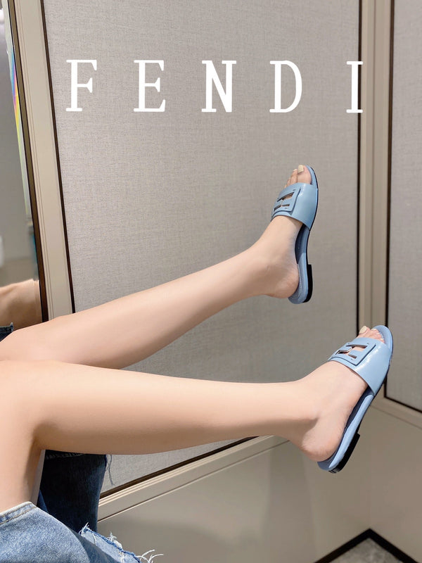 FENDI BAGUETTE SLIDES IN BABY BLUE LAMBSKIN