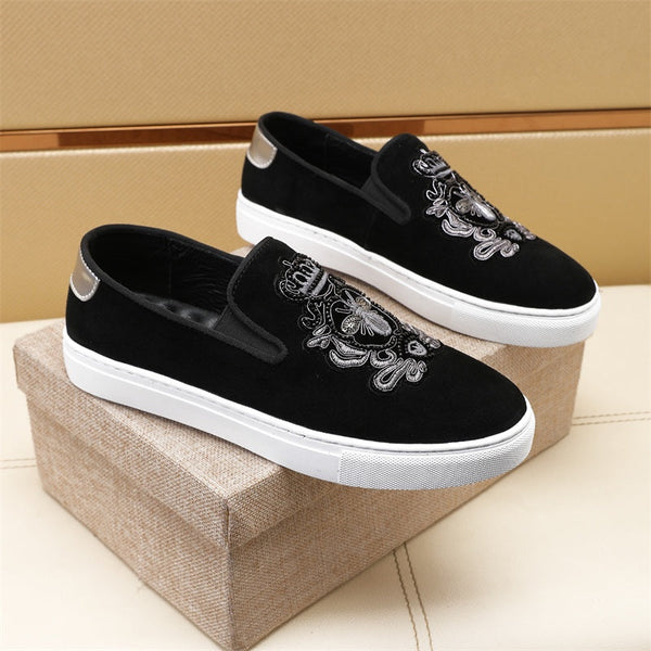 Mocassini slip-on da uomo GG in pelle scamosciata nera 545715