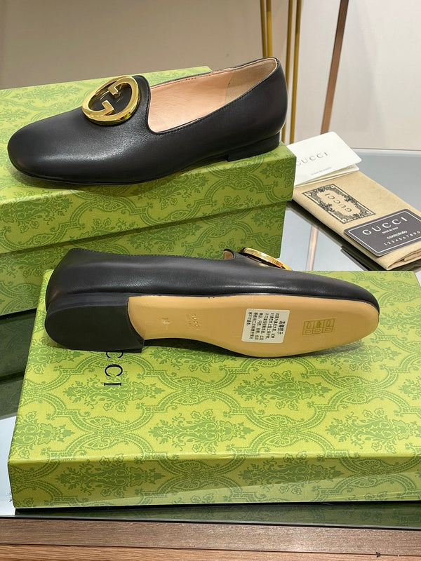 BLONDIE LOGO-PLAQUE LOAFERS IN BLACK CALFSKIN
