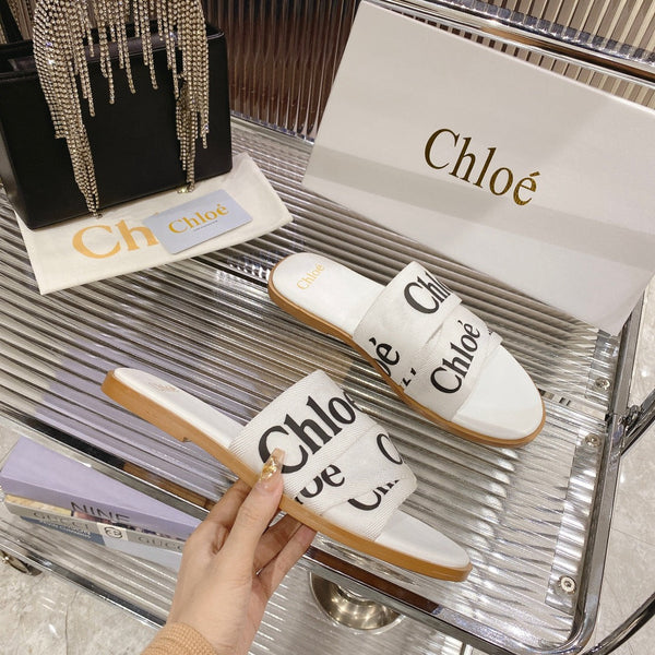 CHLOÉ WOODY SLIPPER IN WHITE MIX BLACK CANVAS