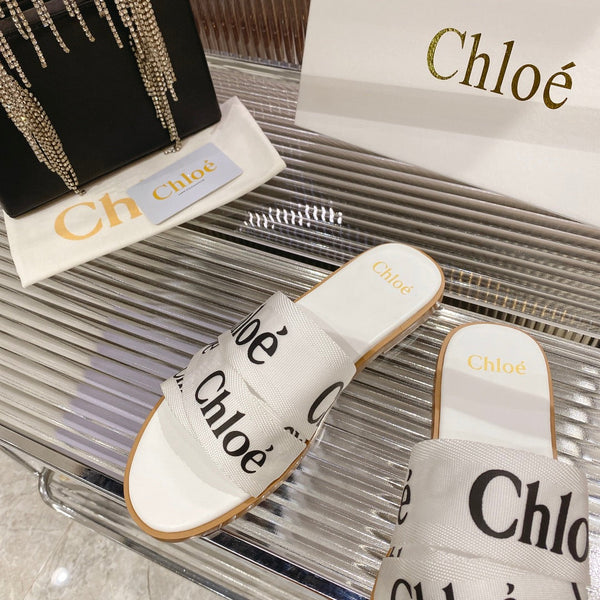 CHLOÉ WOODY SLIPPER IN WHITE MIX BLACK CANVAS