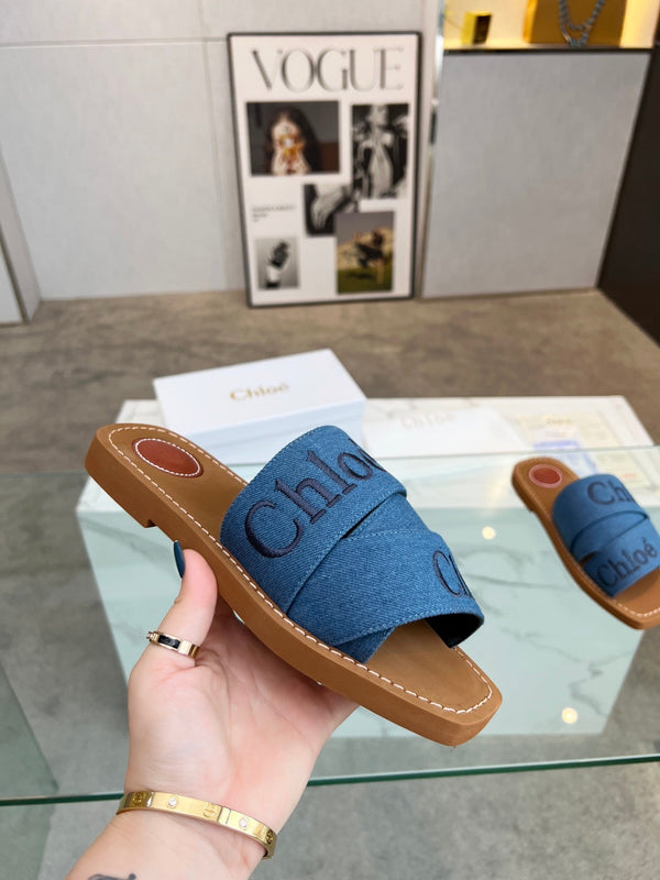 CHLOÉ WOODY MULE IN COBALT BLUE DENIM WITH EMBROIDERED LOGO
