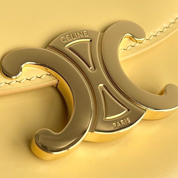 TRIOMPHE SHINY CALFSKIN HANDBAG 18 YELLOW PASTEL