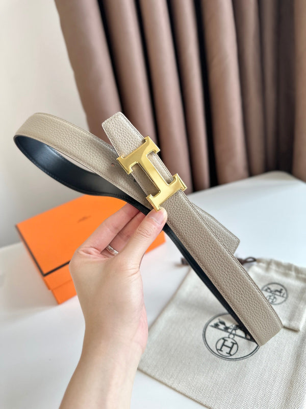 Cintura reversibile con fibbia H in oro HM da 32 mm, in pelle nera e beige 124654