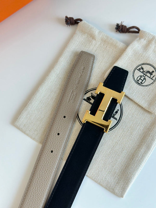 Cintura reversibile con fibbia H in oro HM da 32 mm, in pelle nera e beige 124654