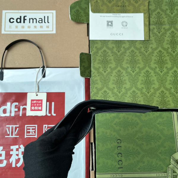 PORTAFOGLIO 11 IN PELLE DI VITELLO GOFFRATA NERA