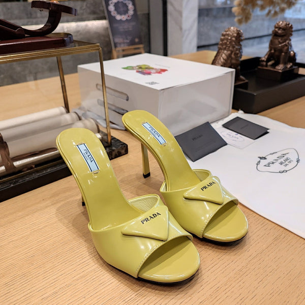Prad 26s Open Toe Mules 100mm In Lime Yellow Patent Calfskin With Logo