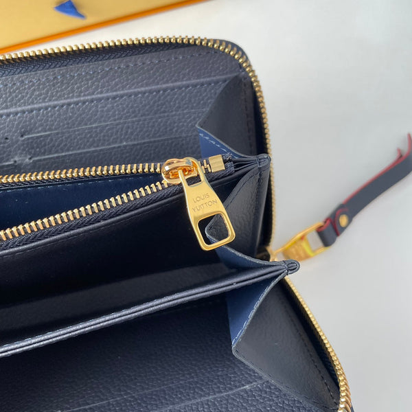 Portafoglio Zippy LV M61864 in pelle Empreinte con monogramma blu 221616