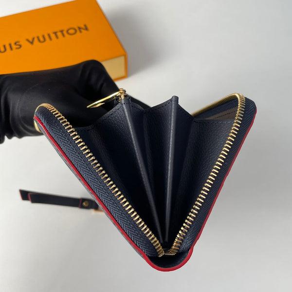 Portafoglio Zippy LV M61864 in pelle Empreinte con monogramma blu 221616