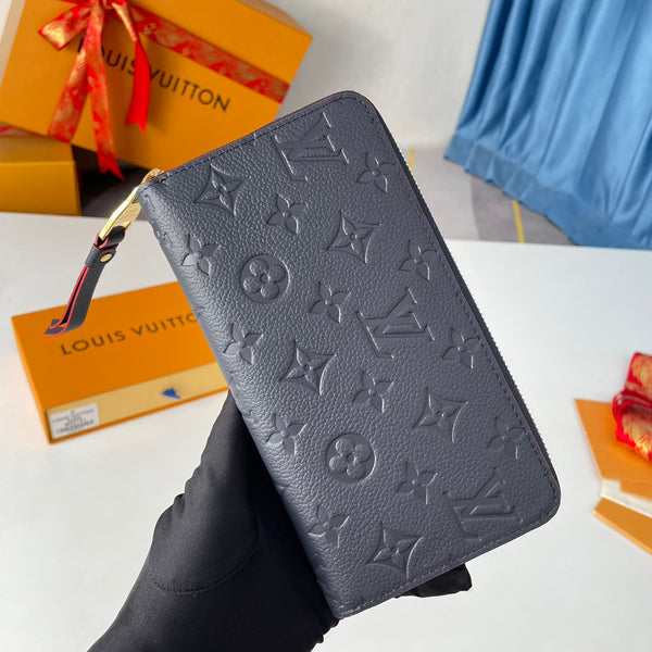 Portafoglio Zippy LV M61864 in pelle Empreinte con monogramma blu 221616