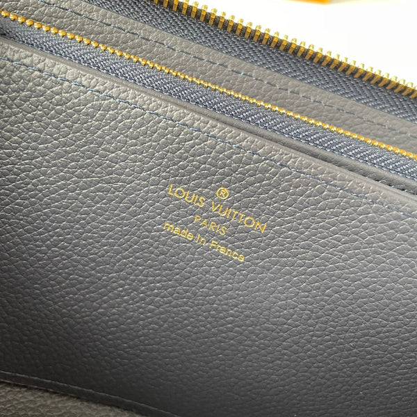 Portafoglio Zippy LV M61864 in pelle Empreinte con monogramma blu 221616